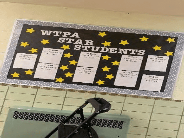 Bulletin board with "WTPA Star Students" and spaces for student names.