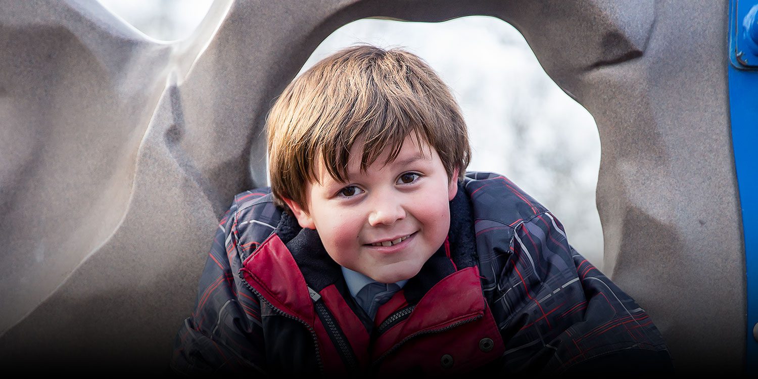 Smiling student at the playground